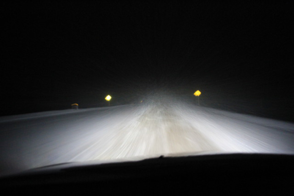 Snow falling on Alberta Highway 16
