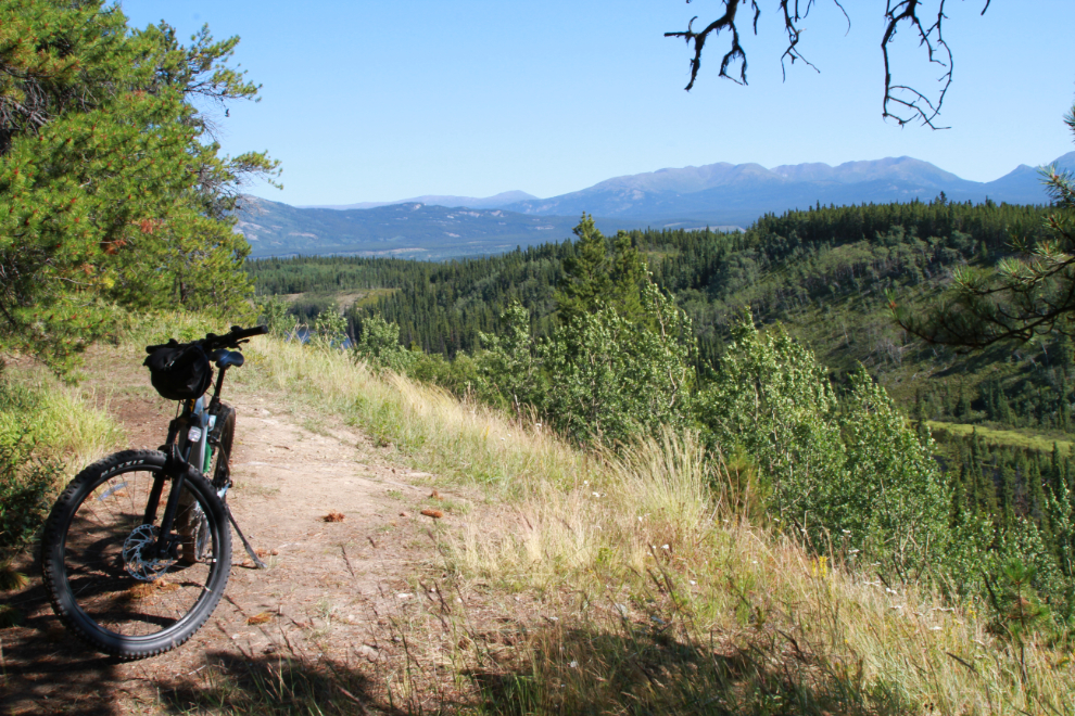 E-biking the historic Canol pipeline road at Mary Lake in Whitehorse