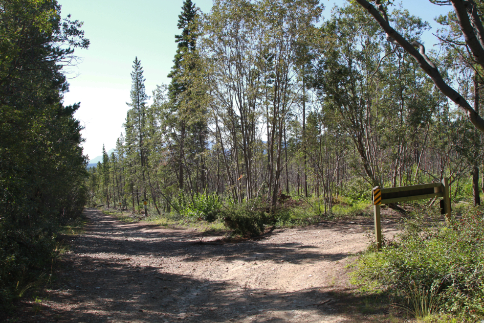 The junction of the Canol pipeline road and the Trans Canada Trail