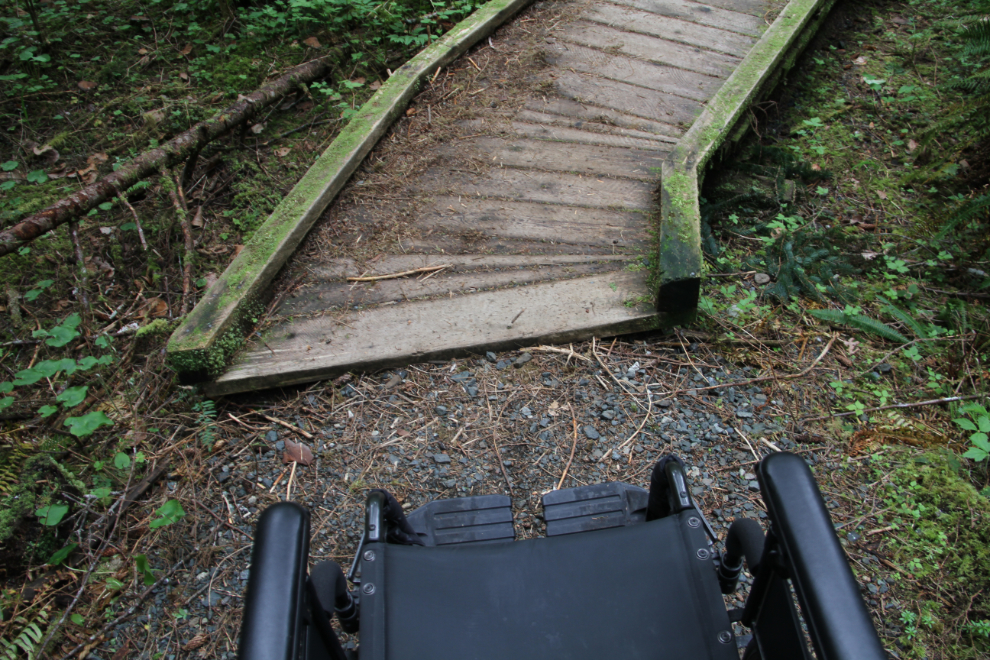Wheelchair problems on the trail to San Josef Bay, Cape Scott Provincial Park, BC
