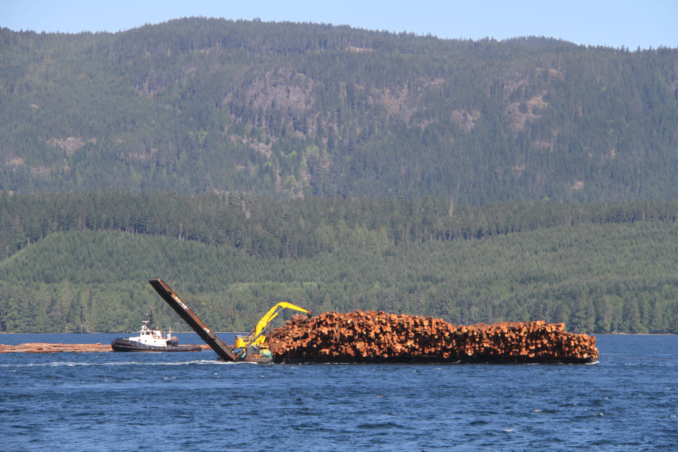 Log barge and boom in Seymour Narrows, BC