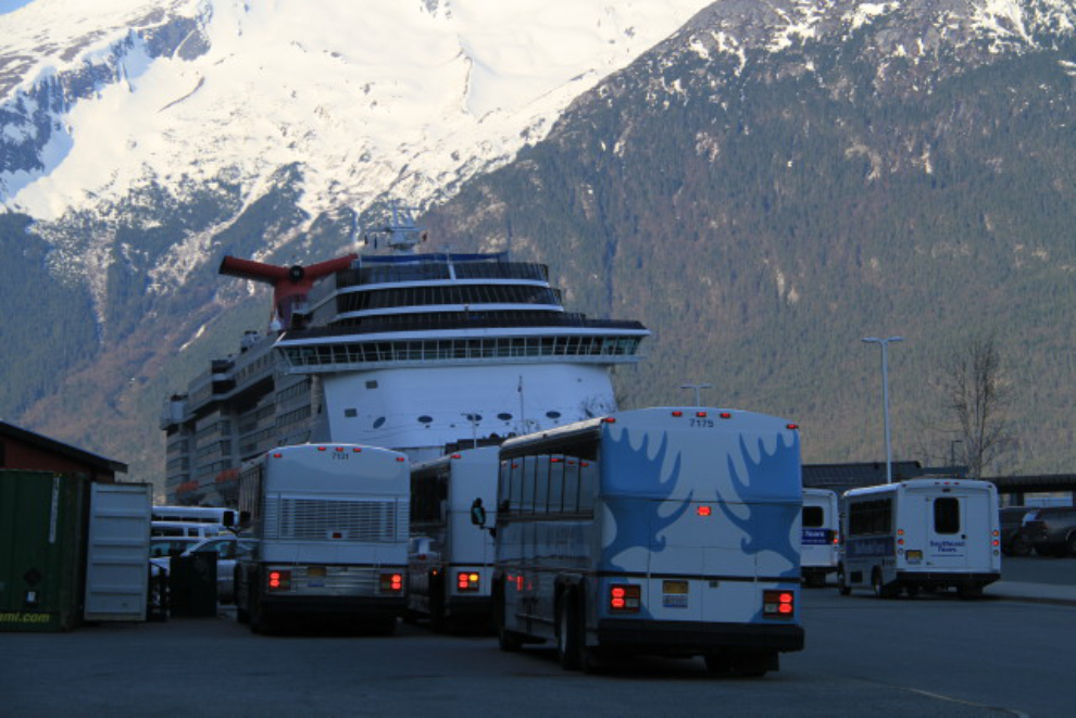 Tour buses meet the Carnival Miracle at Skagway, Alaska