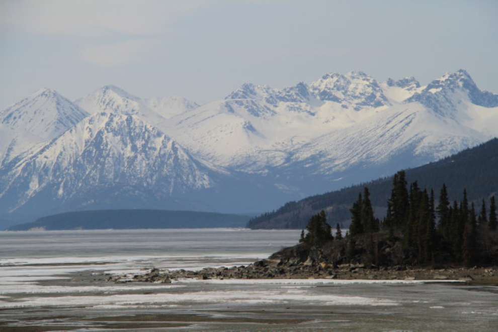 Dramatic snowy peaks along Lake Bennett, Yukon