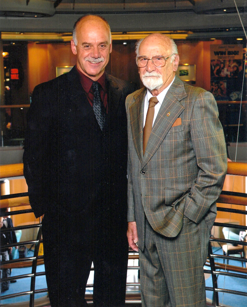 A formal portrait of Murray Lundberg and his Dad on the Radiance of the Seas