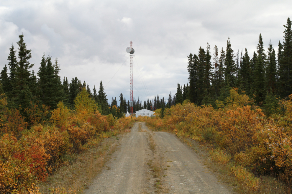 A communications facility and tower above Christmas Creek on the Alaska Highway