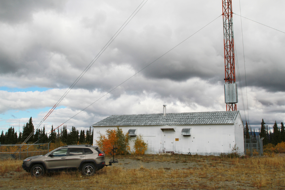 A communications facility and tower above Christmas Creek on the Alaska Highway