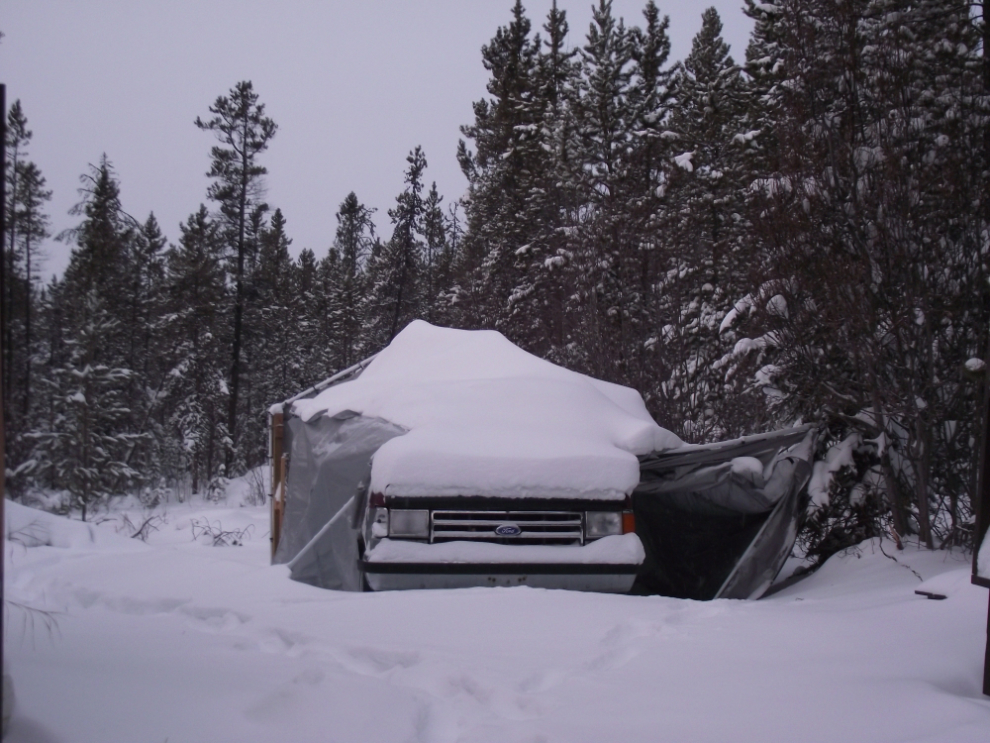 Portable garage collapsed on my truck by snow and wind