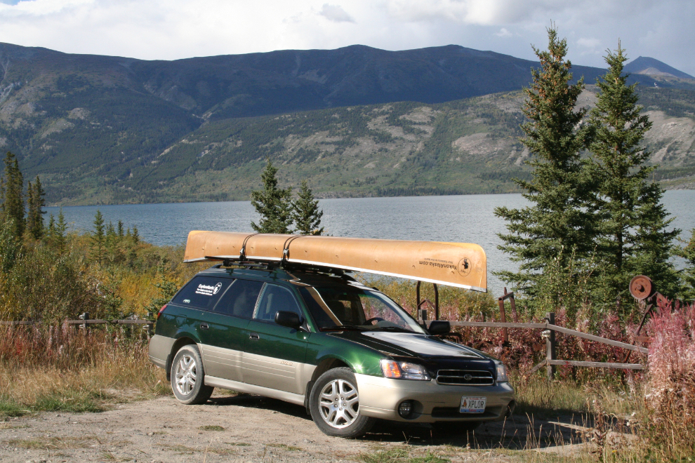 My Subaru Outback and Wenonah-Jensen canoe at the Carcross cabin