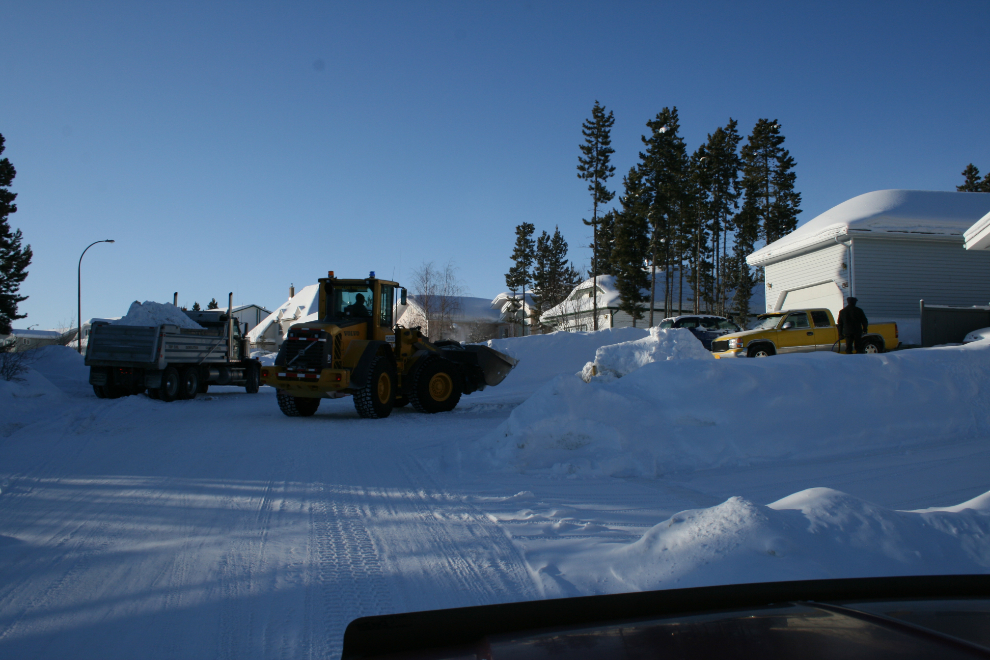 Trucking snow away from our Whitehorse home