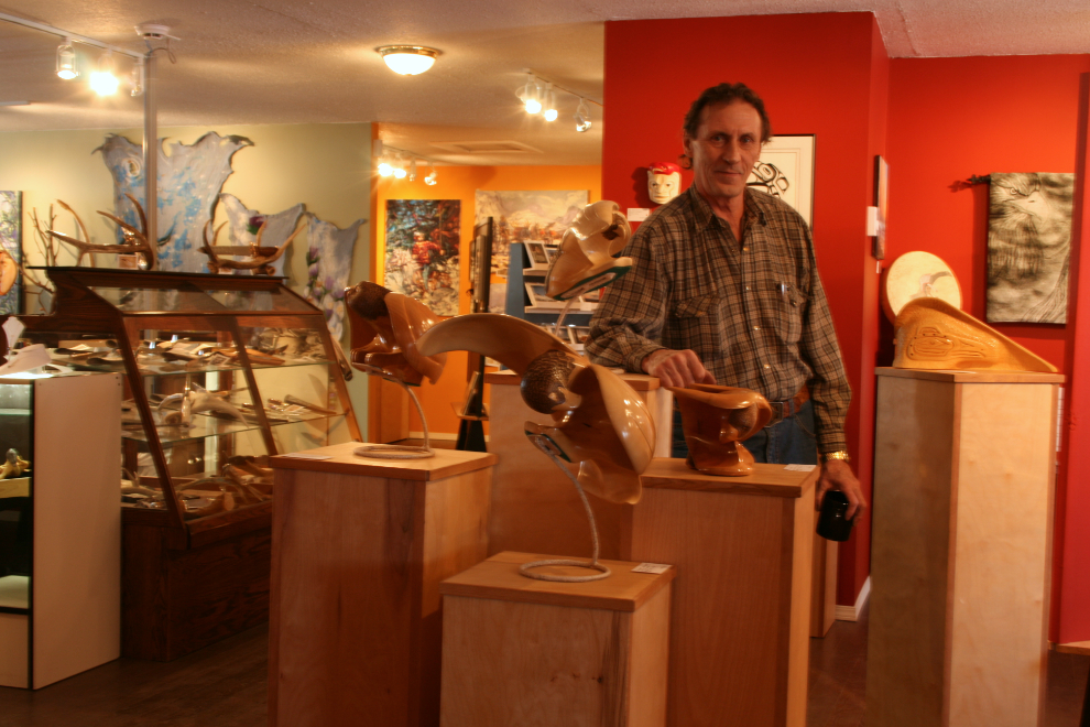 Yukon sculptor Bud Young with some of his work at the Copper Moon