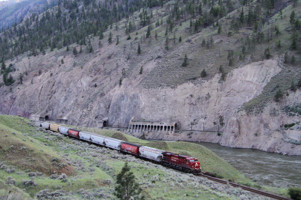 A Canadian Pacific train south of Spences Bridge. The Canadian National line with all the tunnels is on the far side of the Thompson River.
