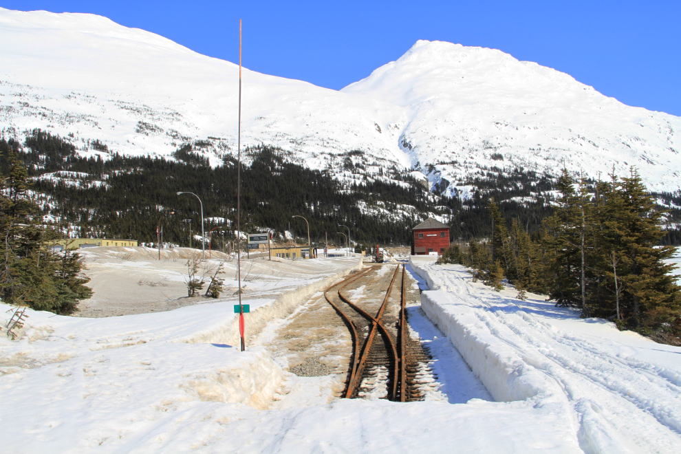 Spring snow clearing on the WP&YR rail line at Fraser, BC