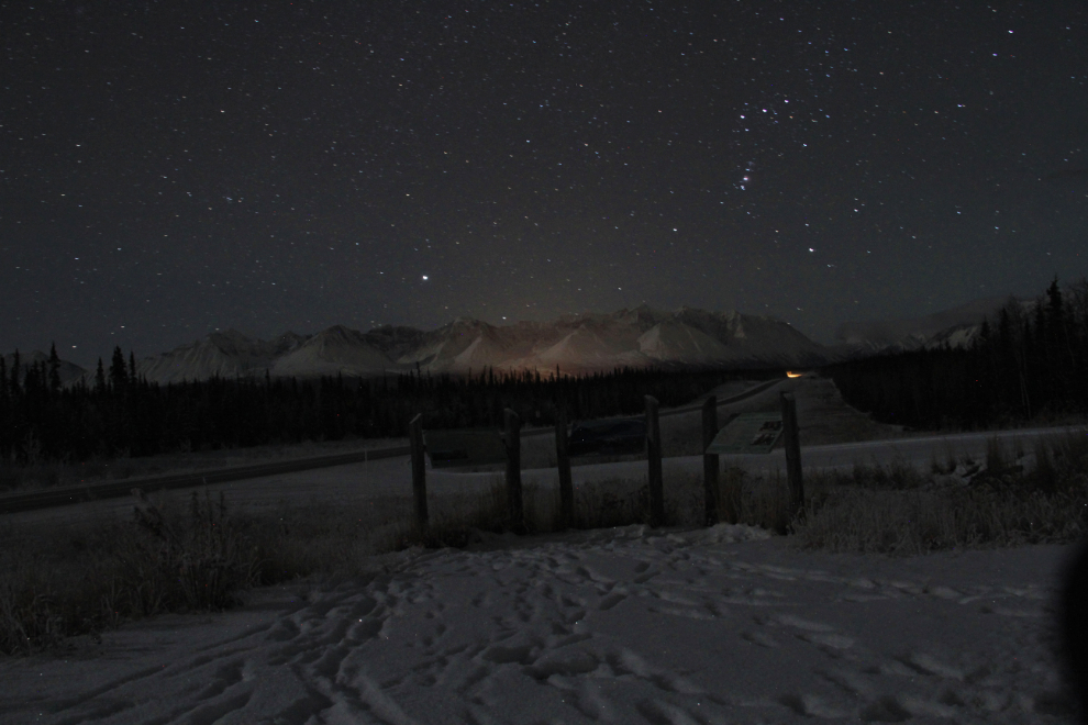The Alaska Highway and Kluane Range on a winter night