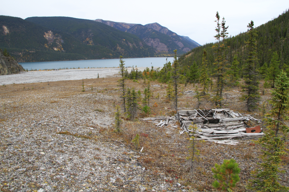 An old logging camp in a canyon along Muncho Lake