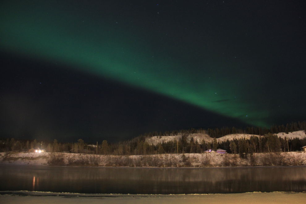 Aurora borealis over the Yukon River in downtown Whitehorse