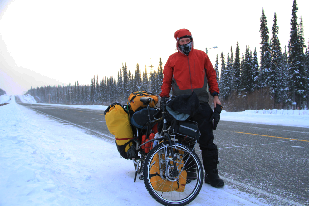 Brek Boughton cycling through a Yukon winter