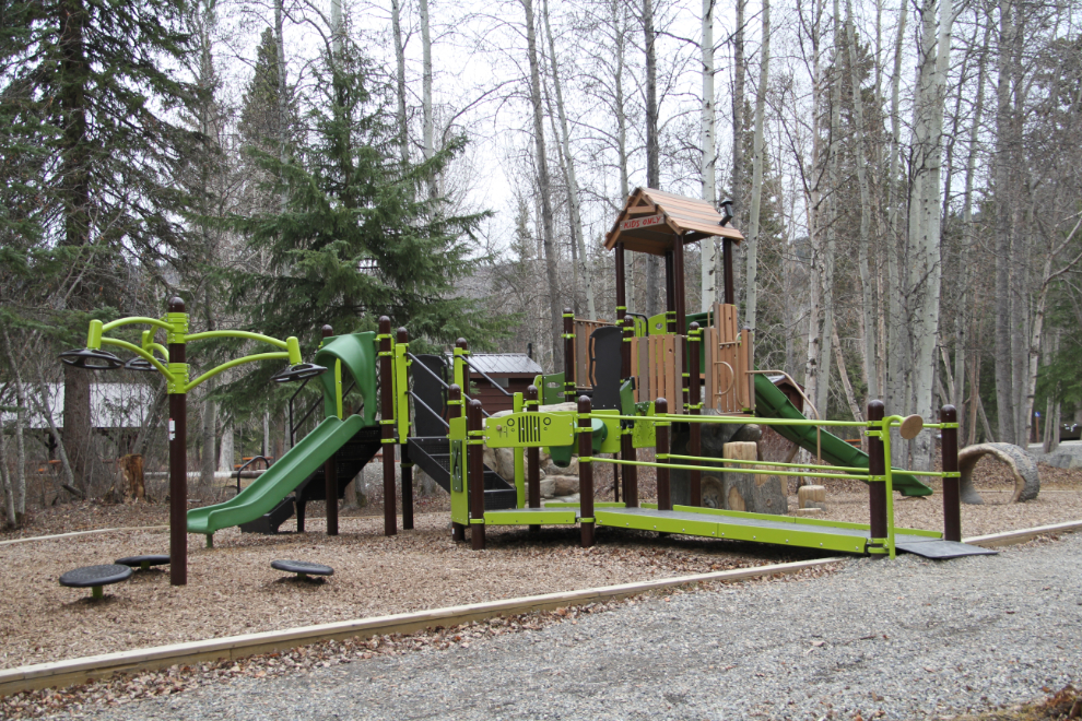 Children's playground at  Liard River Hot Springs Provincial Park in April. Photo by Murray Lundberg