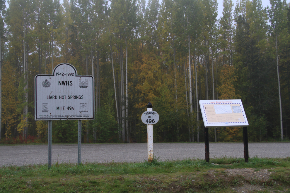 Interpretive panels describe the Liard River Hot Springs area and its history.