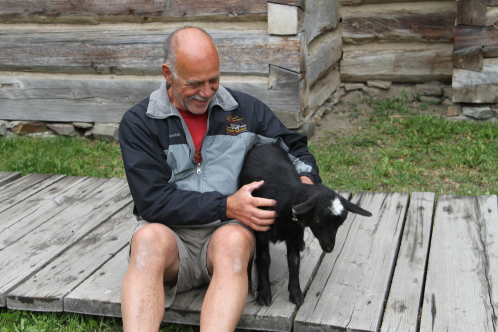 Murray Lundberg with a goat at Fort St. James National Historic Site, BC