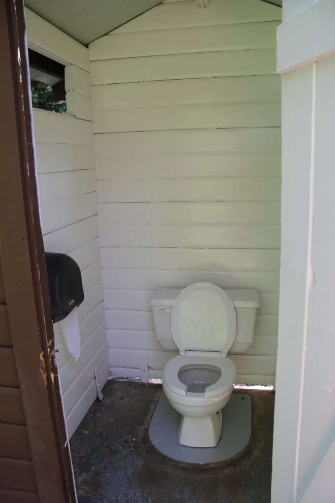 Flush toilets in the outhouses at Purden Lakes Provincial Park, BC