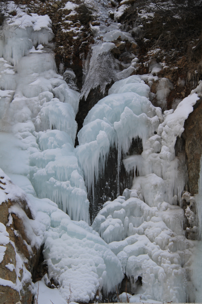 Half-frozen waterfall on the South Klondike Highway