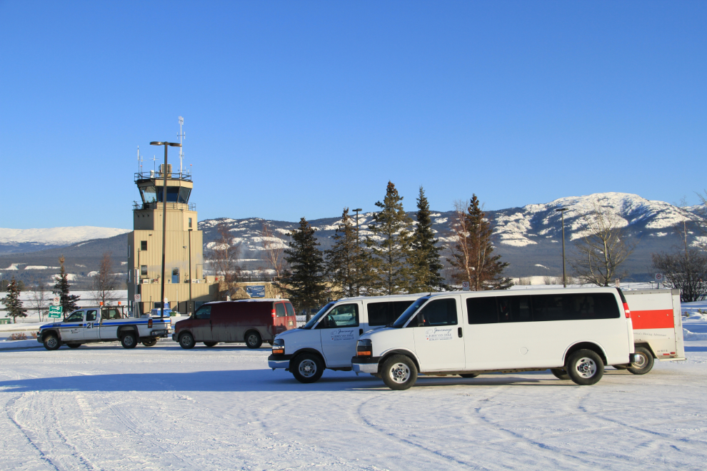 Winter tour vans at the Whitehorse airport