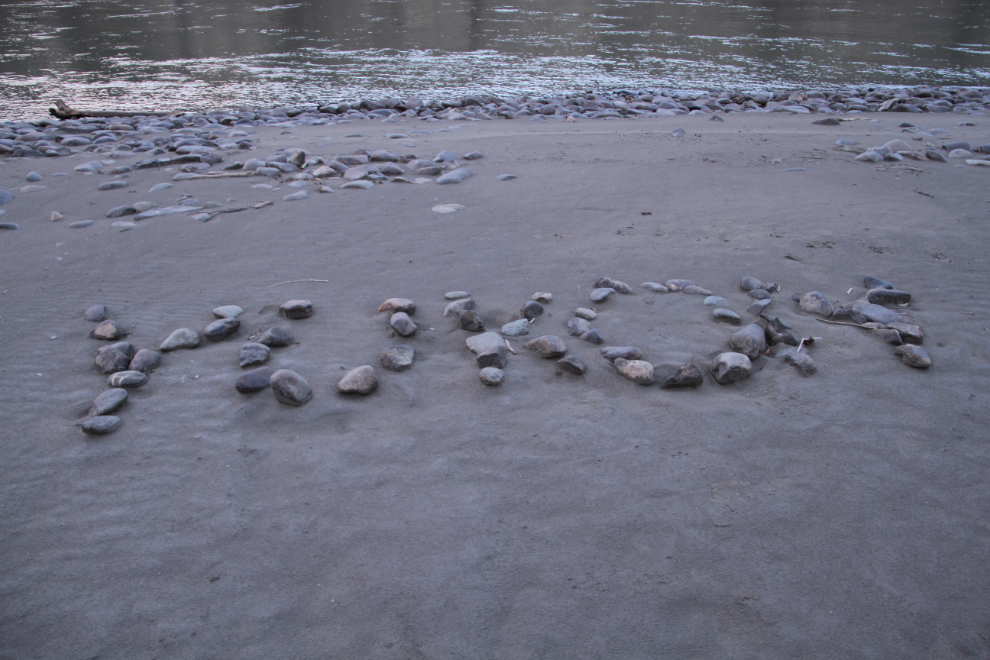 Rocks spelling 'YUKON' along the Yukon River