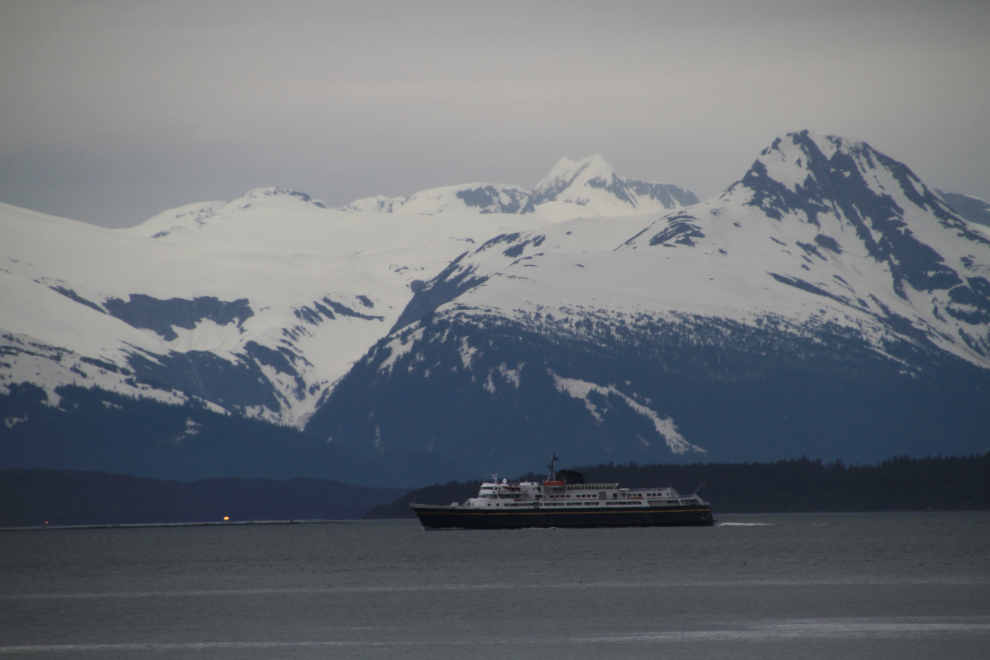 An Alaska state ferry departs from the Auke Bay terminal