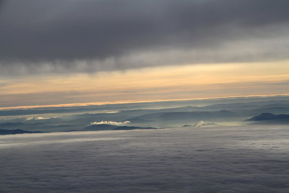 Vancouver Island with multiple cloud and fog layers.
