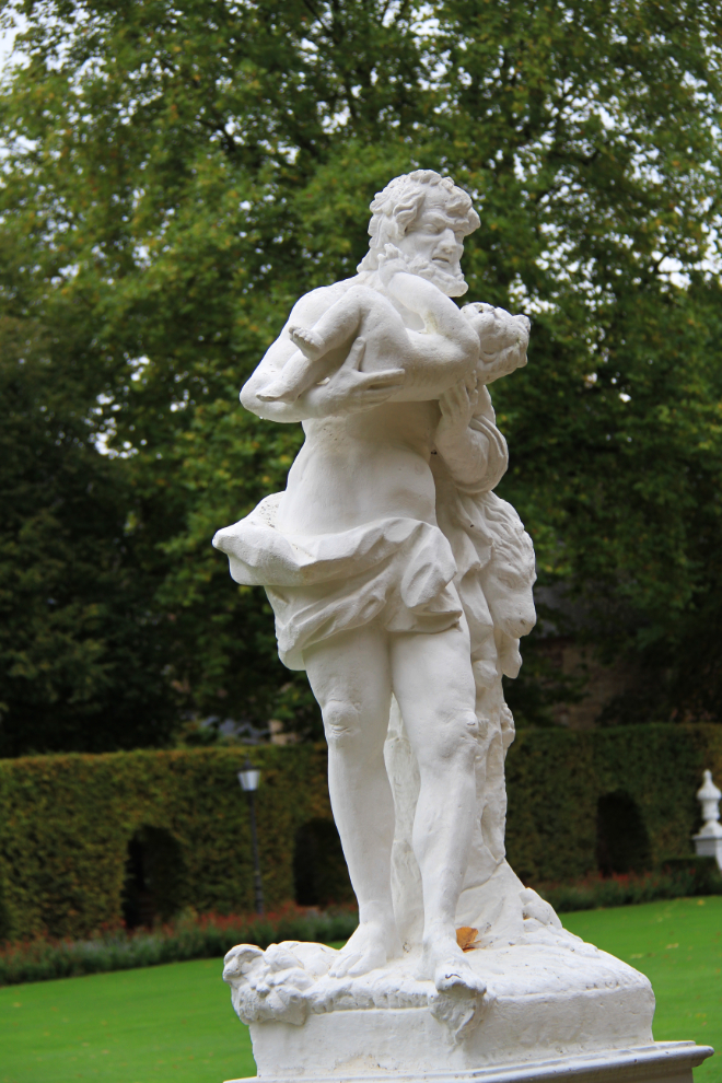 Sculpture of a man and baby in Trier, Germany