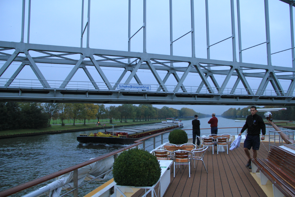 Sailing under a bridge, towards Amsterdam