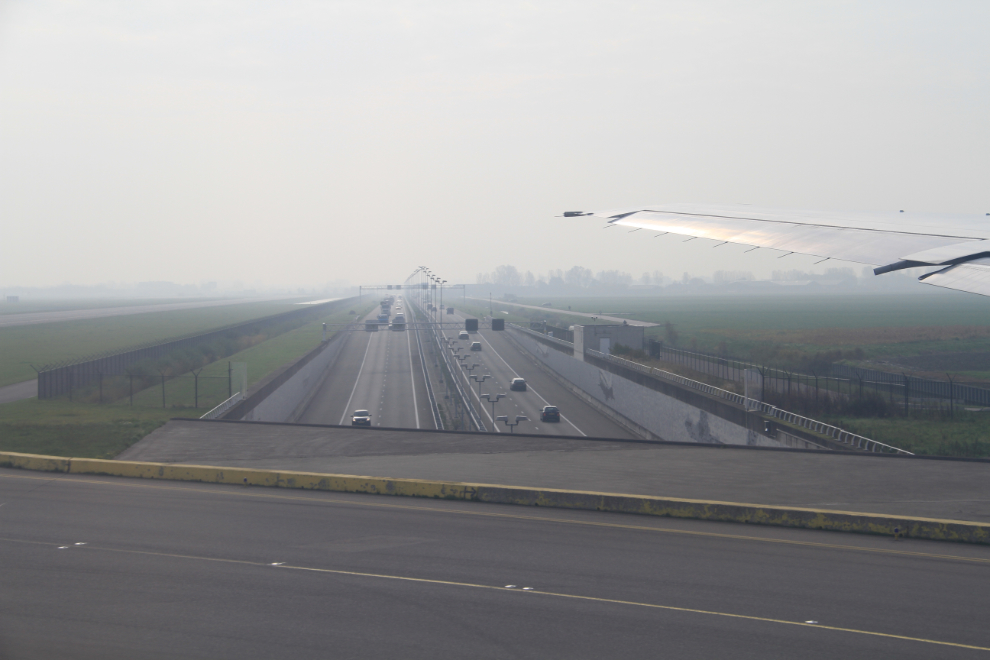 Taxiing over a freeway at Schiphol airport, Amsterdam