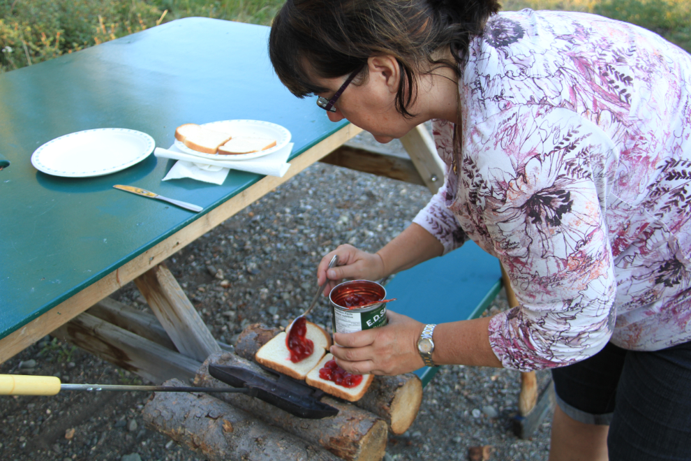 Preparing pies to cook over a campfire