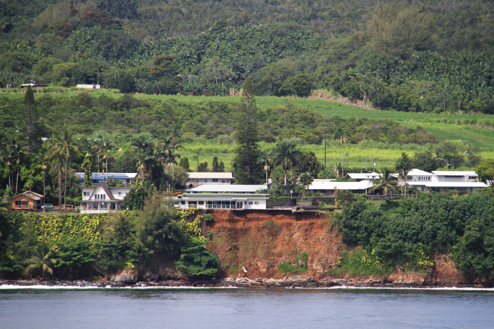 House falling off a cliff into the sea near Hilo