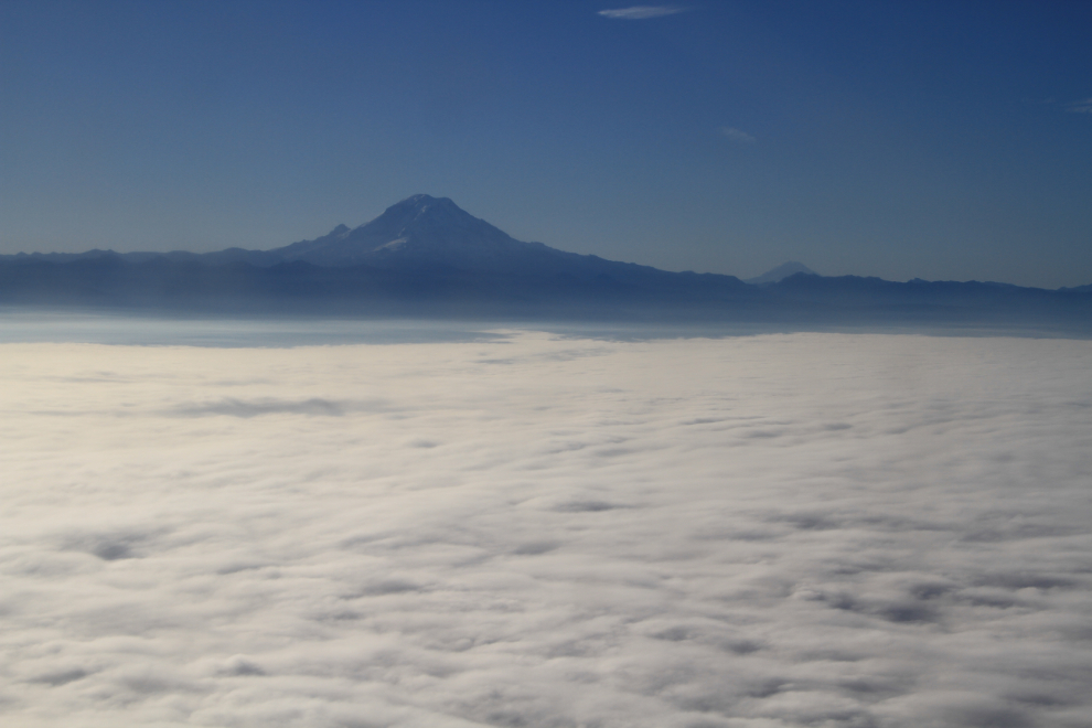Mt. Rainier above a low morning fog.