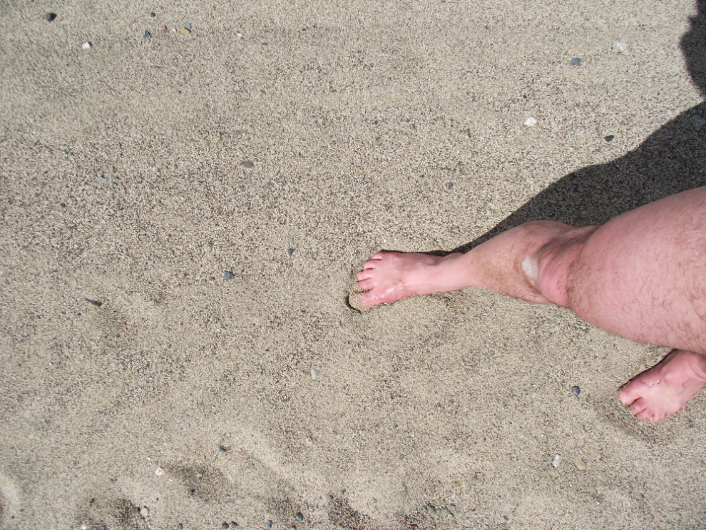Barefoot on coarse sand
