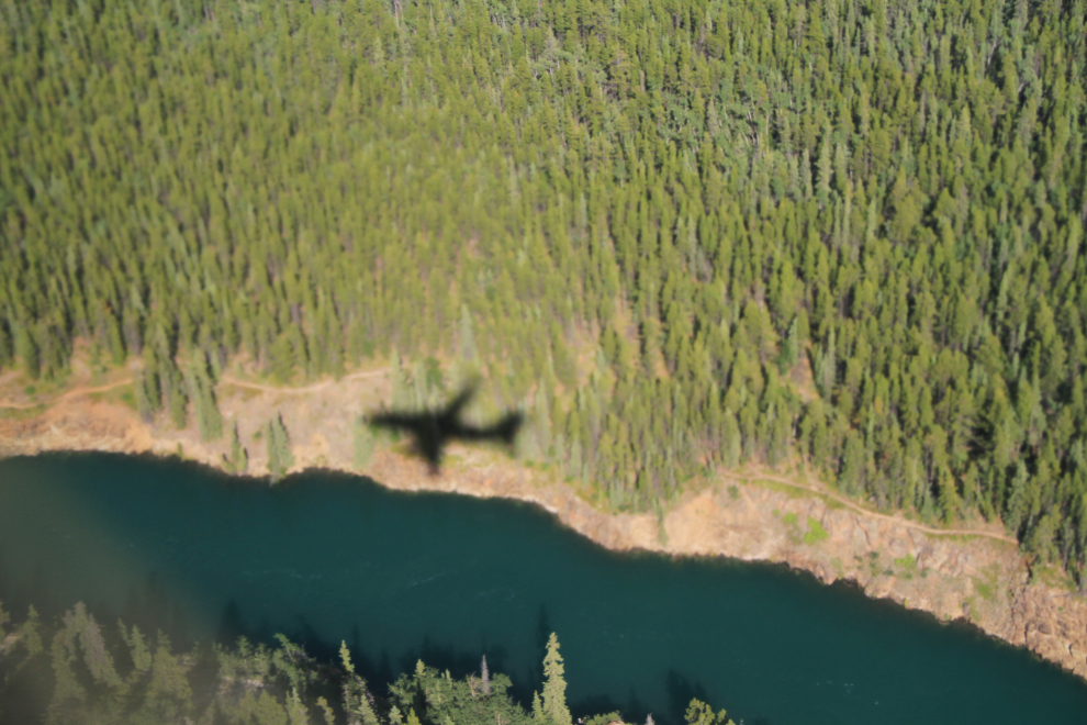 Jet shadow on the bank of Miles Canyon on the Yukon River