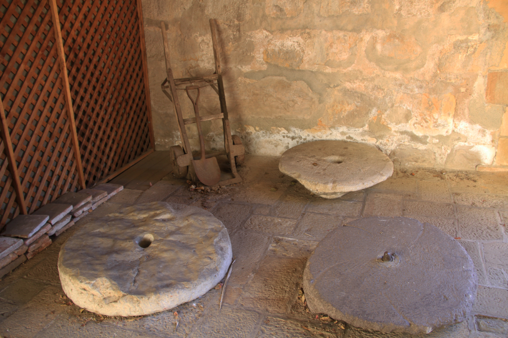 Some early tools and millstones at Mission Santa Barbara, California