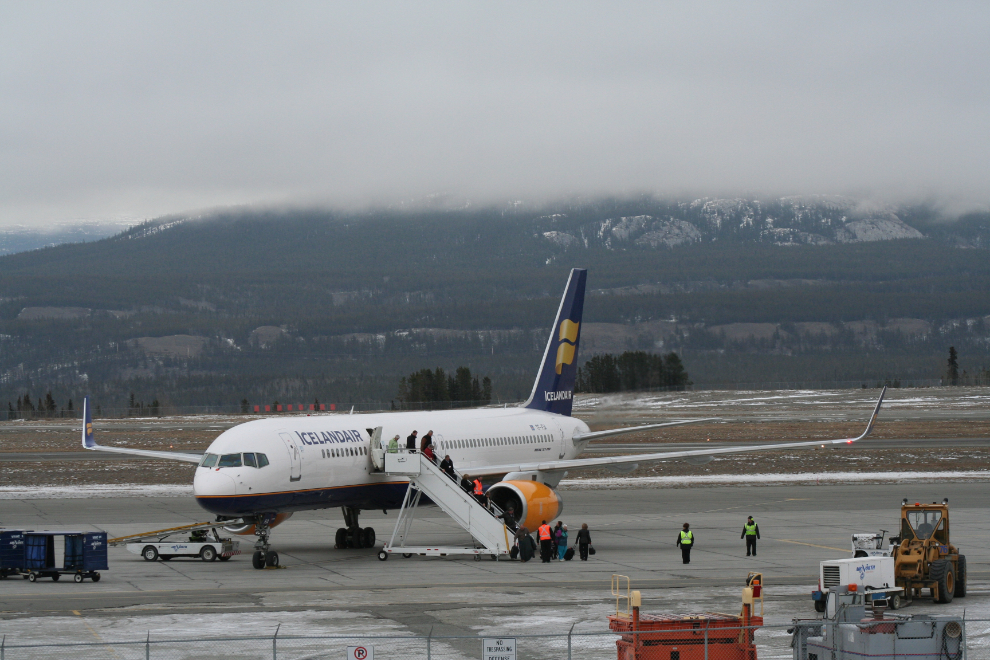 TF-FIA, an Icelandair Boeing 757-200, disembarks passengers on the ramp at Whitehorse