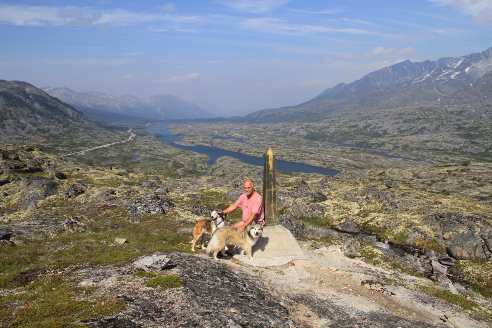 Murray Lundberg and his dogs at one of the Canada/USA border monuments in the White Pass