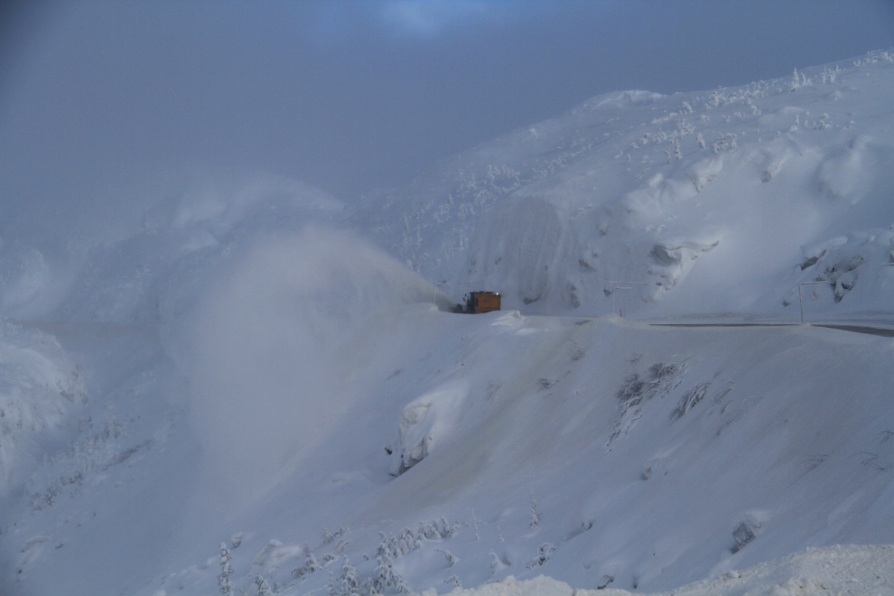 Alaska Highways rotary snow blower working