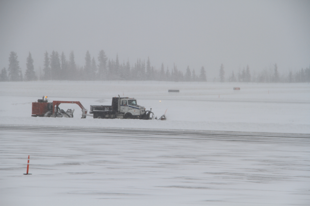 Snowplow working at the Whitehorse airport