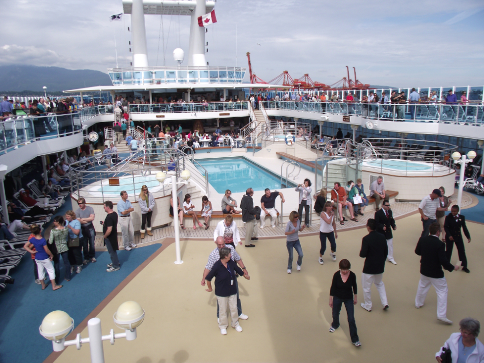The Lido Deck of the Coral Princess is the place to be for sailaway on a sunny day.