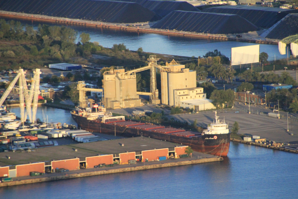 A freighter and small industrial area in Toronto, seen from the CN Tower