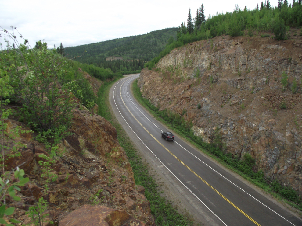 A large rock cut at Mile 1276 of the Alaska Highway