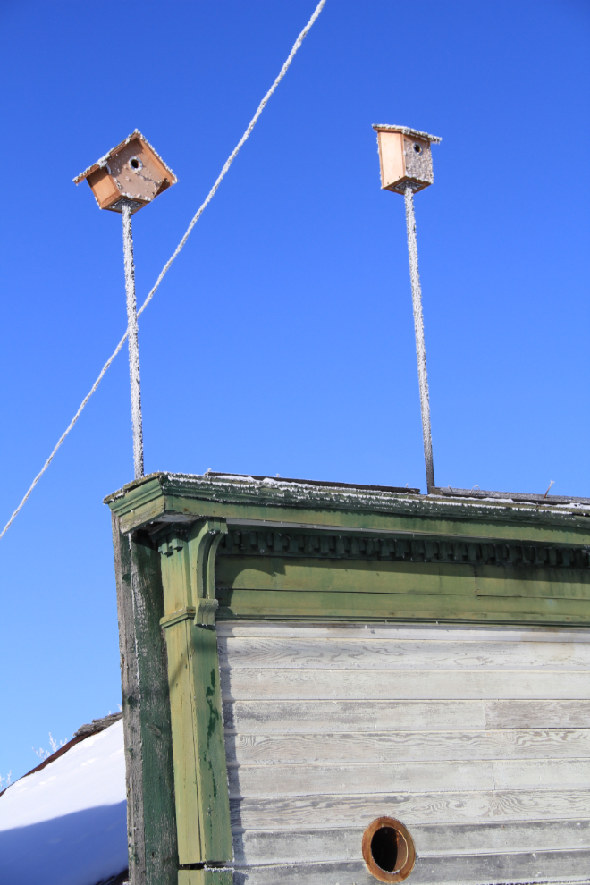 Birdhouses on a heritage building in Carcross, Yukon
