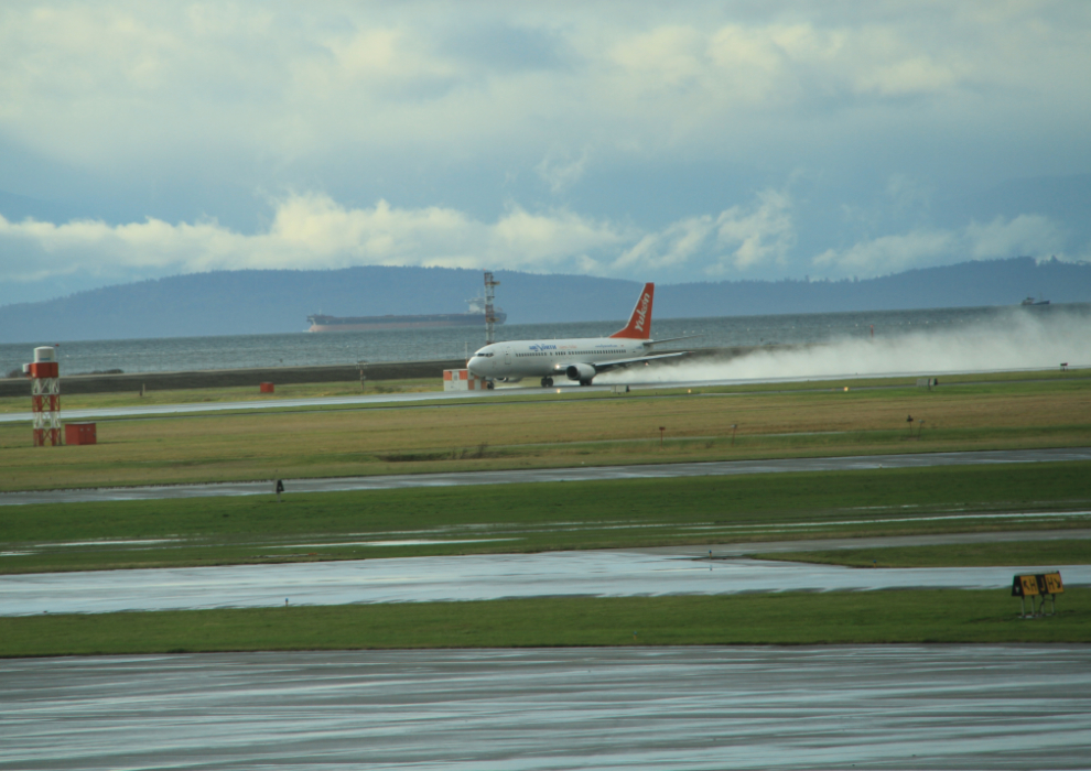 Air North landing at rainy Vancouver