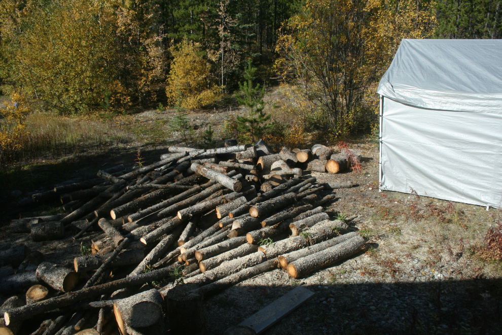 Firewood and snowplow-truck shelter