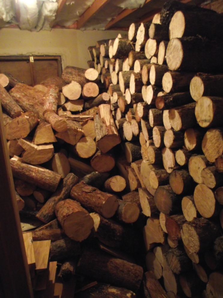 A firewood room in the basement