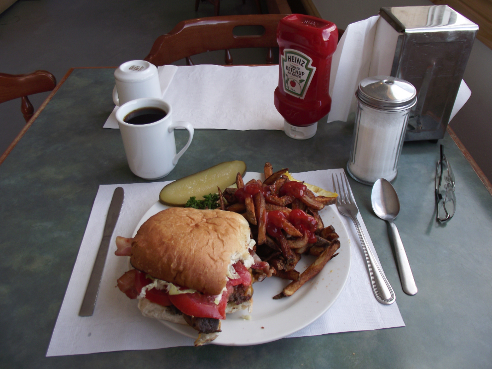 A huge burger and fries at Jakes Corner on the Alaska Highway